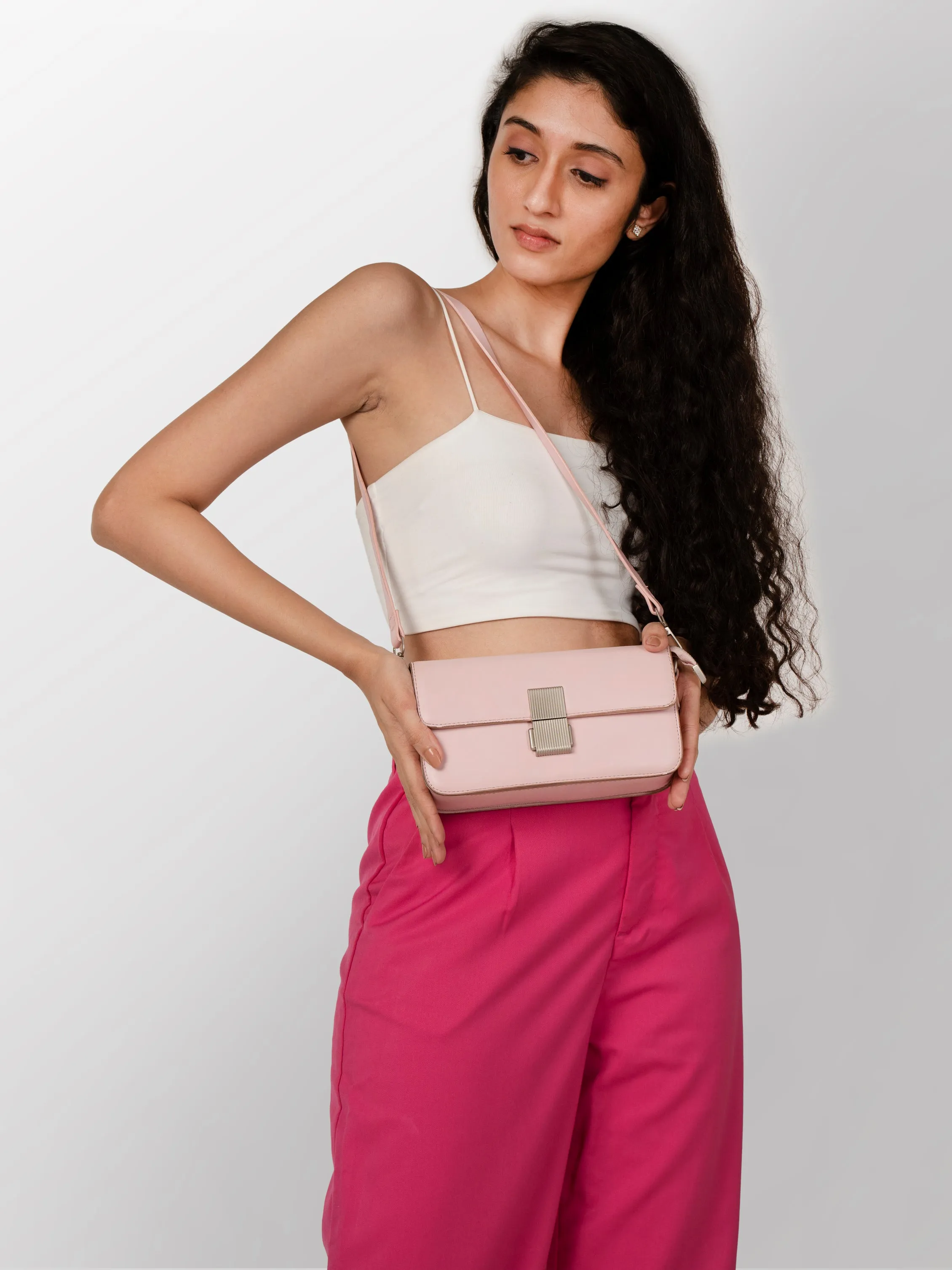 Women baby pink solid hand bag